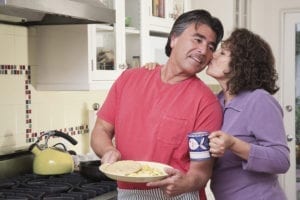 Senior Hispanic couple in kitchen